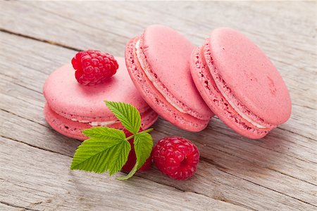 simsearch:400-06564979,k - Pink raspberry macaron cookies on wooden table background Stock Photo - Budget Royalty-Free & Subscription, Code: 400-08294946