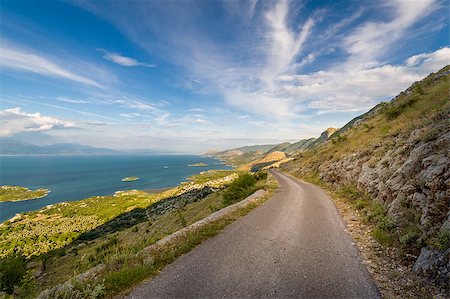 steffus (artist) - Mountain road on the western side of Skadar lake national park. Montenegro. Fotografie stock - Microstock e Abbonamento, Codice: 400-08295616