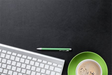 desktop work desk background - Office leather desk table with computer, pen and coffee cup. Top view with copy space Stock Photo - Budget Royalty-Free & Subscription, Code: 400-08295777
