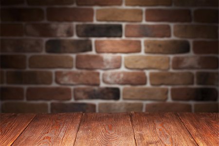 empty tabletop - Wooden table and brick wall. View with copy space. Focus on table. Stock Photo - Budget Royalty-Free & Subscription, Code: 400-08295869