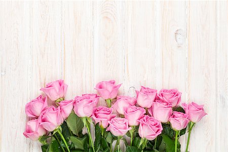 simsearch:400-08110734,k - Pink roses bouquet over wooden table. Top view with copy space Stock Photo - Budget Royalty-Free & Subscription, Code: 400-08295903