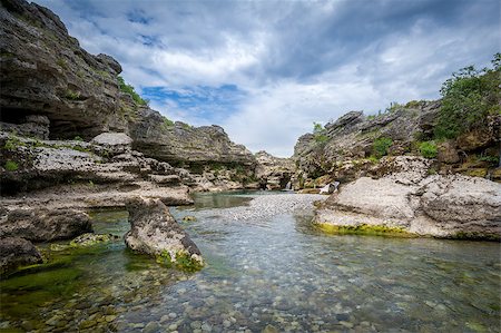 steffus (artist) - Cijevna river canyon in Montenegro. Rocks and crystal clear water landscape. Fotografie stock - Microstock e Abbonamento, Codice: 400-08296724