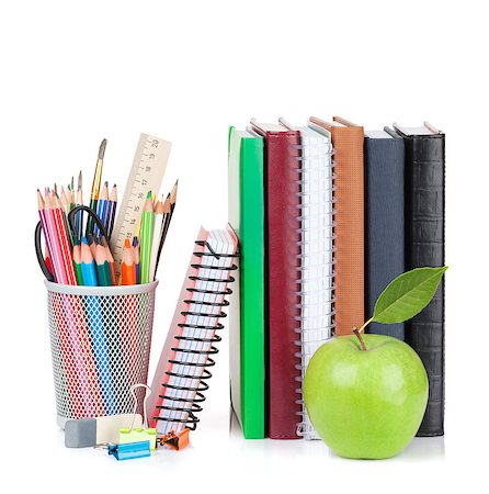 simsearch:400-08037305,k - School and office supplies. Notepads, colorful pencils and apple. Isolated on white background Fotografie stock - Microstock e Abbonamento, Codice: 400-08296794