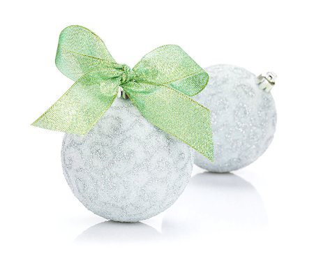 simsearch:400-07921368,k - Christmas baubles and green ribbon. Isolated on white background Stock Photo - Budget Royalty-Free & Subscription, Code: 400-08296810
