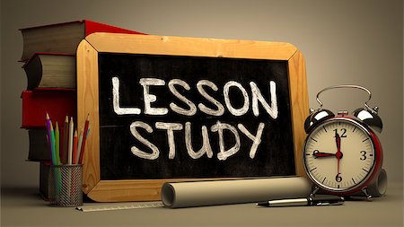 Handwritten Lesson Study on a Chalkboard. Composition with Chalkboard and Stack of Books, Alarm Clock and Rolls of Paper on Blurred Background. Toned Image. Stock Photo - Budget Royalty-Free & Subscription, Code: 400-08297799