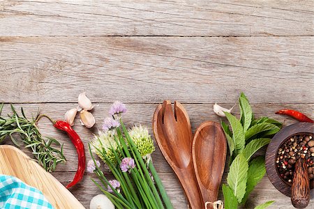 Fresh herbs and spices on wooden table. Top view with copy space Stock Photo - Budget Royalty-Free & Subscription, Code: 400-08298037
