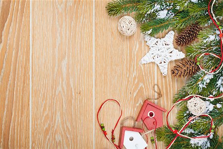 simsearch:400-07246701,k - Christmas wooden background with snow fir tree, decor and copy space Stock Photo - Budget Royalty-Free & Subscription, Code: 400-08298117