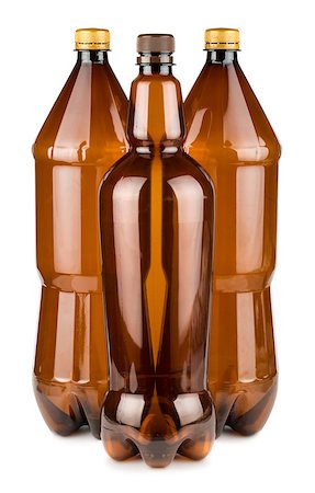 simsearch:400-03928997,k - Three brown empty plastic bottles isolated on white background Photographie de stock - Aubaine LD & Abonnement, Code: 400-08298178