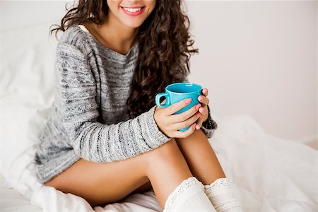 simsearch:400-08299475,k - Beautiful woman on bed drinking a coffee Stock Photo - Budget Royalty-Free & Subscription, Code: 400-08298415