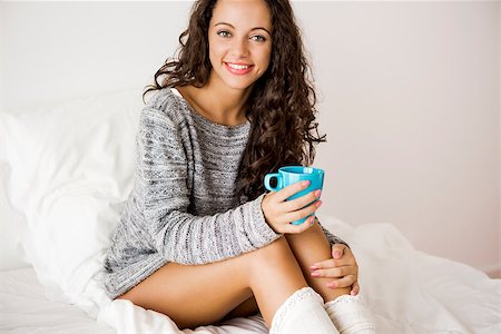 simsearch:400-08299475,k - Beautiful woman on bed drinking a coffee Stock Photo - Budget Royalty-Free & Subscription, Code: 400-08298416