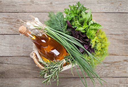 simsearch:400-07578178,k - Fresh garden herbs and olive oil on wooden table. Top view Stock Photo - Budget Royalty-Free & Subscription, Code: 400-08298853