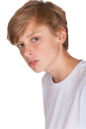 Studio Cut Out Portrait of Teenage Boy Child in White T-shirt Stock Photo - Budget Royalty-Free & Subscription, Code: 400-08299084
