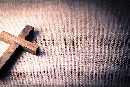 simsearch:400-07090264,k - An aerial view of a holy wooden Christian cross on a burlap background. Stock Photo - Budget Royalty-Free & Subscription, Code: 400-08299308