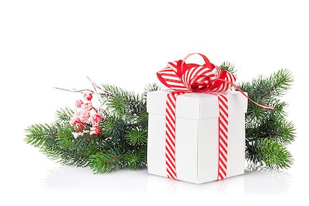 simsearch:400-07933751,k - Christmas gift box and fir tree branch. Isolated on white background Photographie de stock - Aubaine LD & Abonnement, Code: 400-08299729