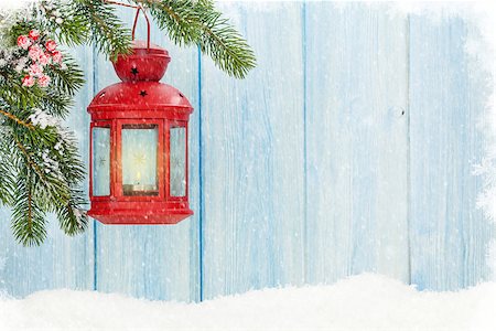 Christmas candle lantern on fir tree branch in snow. View with copy space Stock Photo - Budget Royalty-Free & Subscription, Code: 400-08299765