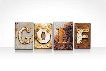 The word "GOLF" written in rusty metal letterpress type isolated on a white background. Stock Photo - Budget Royalty-Free & Subscription, Code: 400-08290824