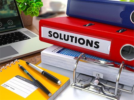 simsearch:400-08286852,k - Red Ring Binder with Inscription Solutions on Background of Working Table with Office Supplies, Laptop, Reports. Toned Illustration. Business Concept on Blurred Background. Fotografie stock - Microstock e Abbonamento, Codice: 400-08291115