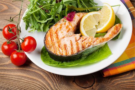 simsearch:400-05295567,k - Grilled salmon and salad on wooden table Stock Photo - Budget Royalty-Free & Subscription, Code: 400-08291191