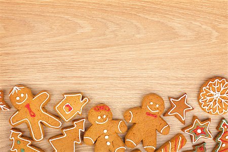 simsearch:400-07175496,k - Homemade various christmas gingerbread cookies on wooden background with copy space Fotografie stock - Microstock e Abbonamento, Codice: 400-08291225