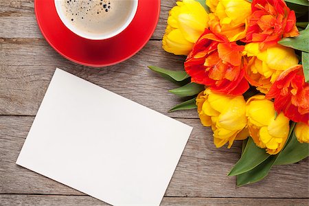 simsearch:400-07662543,k - Colorful tulips bouquet, blank greeting card and coffee cup on wooden table Stock Photo - Budget Royalty-Free & Subscription, Code: 400-08291237