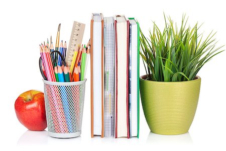 simsearch:400-08037305,k - School and office supplies. Notepads, colorful pencils, flower and apple. Isolated on white background Fotografie stock - Microstock e Abbonamento, Codice: 400-08291338