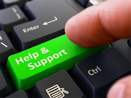 simsearch:400-07222960,k - Help and Support Green Button - Finger Pushing Button of Black Computer Keyboard. Blurred Background. Closeup View. Fotografie stock - Microstock e Abbonamento, Codice: 400-08292271