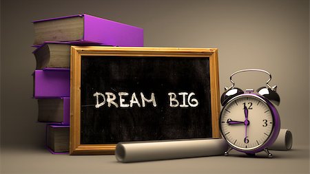 simsearch:400-08497774,k - Dream Big - Chalkboard with Hand Drawn Text, Stack of Books, Alarm Clock and Rolls of Paper on Blurred Background. Toned Image. Foto de stock - Super Valor sin royalties y Suscripción, Código: 400-08292333