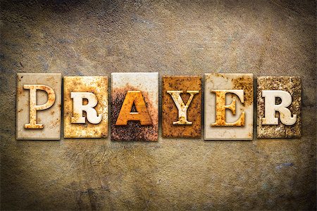 The word "PRAYER" written in rusty metal letterpress type on an old aged leather background. Stock Photo - Budget Royalty-Free & Subscription, Code: 400-08293196