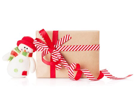 simsearch:400-07933751,k - Christmas gift box and snowman toy. Isolated on white background Photographie de stock - Aubaine LD & Abonnement, Code: 400-08293376