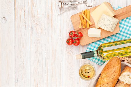 simsearch:400-06461717,k - White wine, cheese and bread on white wooden table background. Top view with copy space Stock Photo - Budget Royalty-Free & Subscription, Code: 400-08293396