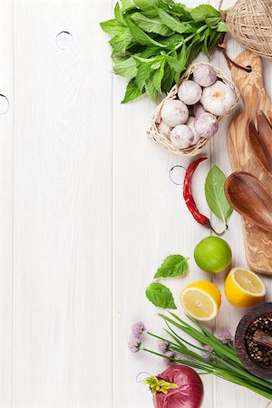 simsearch:400-07578178,k - Fresh herbs and spices on wooden table. Top view with copy space Stock Photo - Budget Royalty-Free & Subscription, Code: 400-08293444