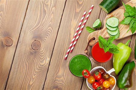 simsearch:400-07172598,k - Fresh vegetable smoothie on wooden table. Tomato and cucumber. Top view with copy space Stock Photo - Budget Royalty-Free & Subscription, Code: 400-08293455