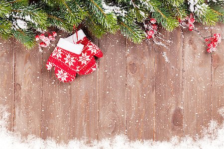 simsearch:400-07179654,k - Christmas wooden background with snow fir tree and decor. View with copy space Photographie de stock - Aubaine LD & Abonnement, Code: 400-08293504