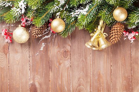 simsearch:400-07179654,k - Christmas wooden background with snow fir tree and decor. View with copy space Photographie de stock - Aubaine LD & Abonnement, Code: 400-08293505