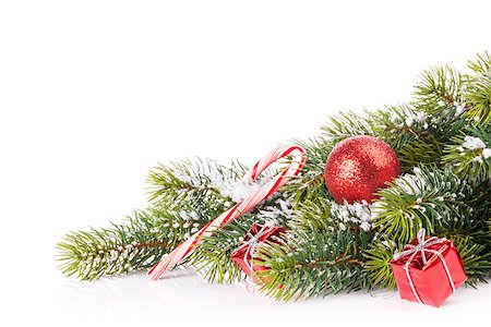 Christmas tree branch with snow and decor. Isolated on white background Stock Photo - Budget Royalty-Free & Subscription, Code: 400-08293508