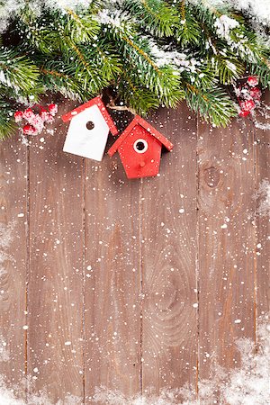 simsearch:400-07179654,k - Christmas wooden background with snow fir tree and decor. View with copy space Photographie de stock - Aubaine LD & Abonnement, Code: 400-08293503