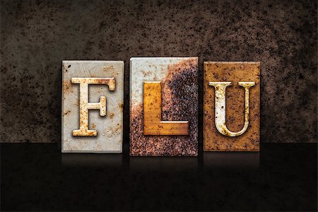 simsearch:400-08166276,k - The word "FLU" written in rusty metal letterpress type on a dark textured grunge background. Stock Photo - Budget Royalty-Free & Subscription, Code: 400-08293760