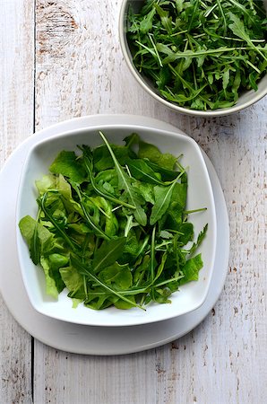 simsearch:400-06485512,k - Fresh arugula / salad rocket / roquette / rucola leaves Stock Photo - Budget Royalty-Free & Subscription, Code: 400-08300274