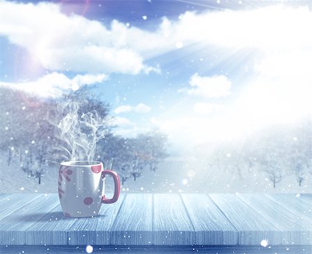 3D render of a Christmas mug on a wooden table against a defocussed snowy landscape Stock Photo - Budget Royalty-Free & Subscription, Code: 400-08300445