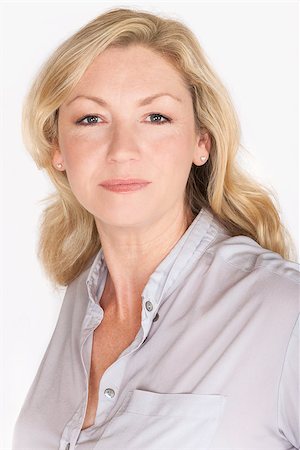 Studio portrait headshot of attractive happy middle aged blond woman in her forties Stock Photo - Budget Royalty-Free & Subscription, Code: 400-08300633