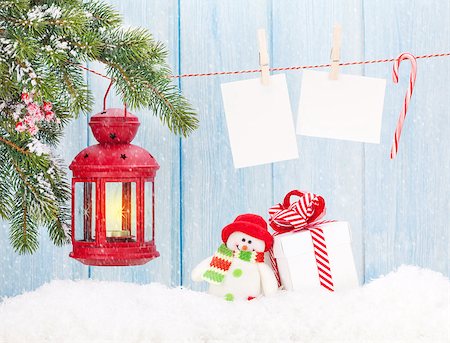 Christmas candle lantern, gift box and blank photo frames Stock Photo - Budget Royalty-Free & Subscription, Code: 400-08301774