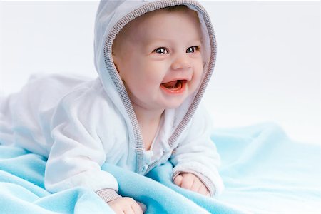 pzromashka (artist) - Cute baby in the hood on a blue blanket Stock Photo - Budget Royalty-Free & Subscription, Code: 400-08314073
