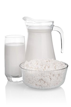 simsearch:400-04499805,k - Glass carafe and a glass of milk and a bowl of cottage cheese isolated on white background. file contains a path to cut Photographie de stock - Aubaine LD & Abonnement, Code: 400-08314487