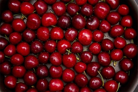 Top view of fresh red cherry with water drops Stock Photo - Budget Royalty-Free & Subscription, Code: 400-08314559