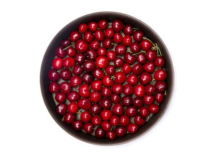 Top view of red cherry in round baking tin, isolated on white background Stock Photo - Budget Royalty-Free & Subscription, Code: 400-08314560