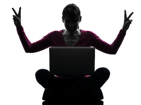 simsearch:400-08317008,k - one  woman happy winning computing laptop computer in silhouette studio isolated on white background Stockbilder - Microstock & Abonnement, Bildnummer: 400-08314805