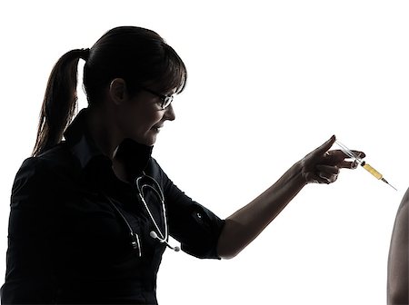 patient shadow - one woman doctor holding surgical needle vaccination silhouette studio isolated on white background Foto de stock - Super Valor sin royalties y Suscripción, Código: 400-08314864