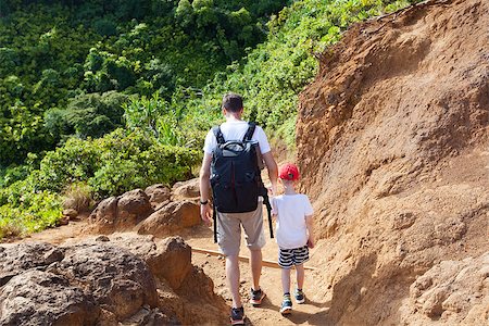 family of two hiking together the kalalau trail at kauai island, hawaii Photographie de stock - Aubaine LD & Abonnement, Code: 400-08315159