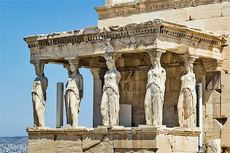 simsearch:400-05909439,k - The Erechtheion is an ancient Greek temple on the north side of the Acropolis of Athens in Greece which was dedicated to both Athena and Poseidon. Foto de stock - Super Valor sin royalties y Suscripción, Código: 400-08315248