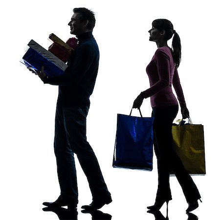 onecouple woman man  christmas present shopping silhouette white background Stock Photo - Budget Royalty-Free & Subscription, Code: 400-08315454